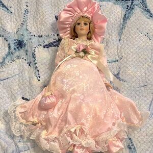 Carnegie Doll established 1921 16in Porcelain Doll with  Pink Lace Dress